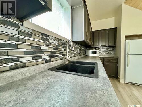 24 Agricultural Avenue, Yorkton, SK - Indoor Photo Showing Kitchen With Double Sink