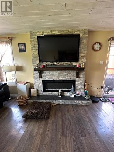 9 Hill Street, Trinity, NL - Indoor Photo Showing Living Room With Fireplace