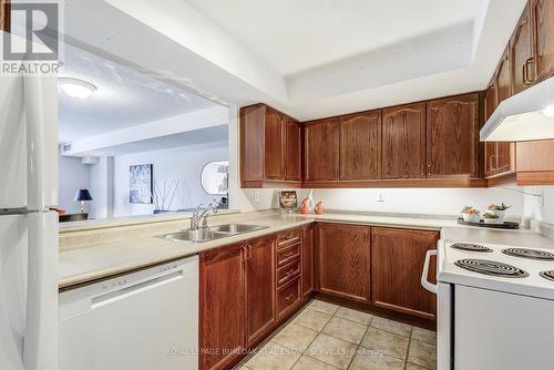 B403 - 216 Plains Road W, Burlington, ON - Indoor Photo Showing Kitchen With Double Sink