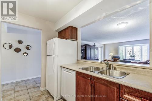 B403 - 216 Plains Road W, Burlington, ON - Indoor Photo Showing Kitchen With Double Sink