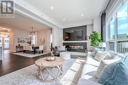 108 Lovett Lane, Guelph (Hanlon Creek), ON - Indoor Photo Showing Living Room With Fireplace