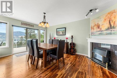 113 Christie Mountain Lane, Okanagan Falls, BC - Indoor Photo Showing Dining Room With Fireplace