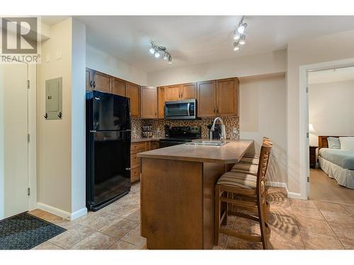 654 Cook Road Unit# 242, Kelowna, BC - Indoor Photo Showing Kitchen With Double Sink