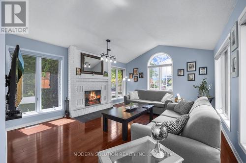 7 Riverview Road N, New Tecumseth (Alliston), ON - Indoor Photo Showing Living Room With Fireplace