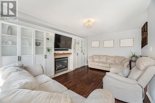 2233 Nevils Street, Innisfil, ON - Indoor Photo Showing Living Room With Fireplace