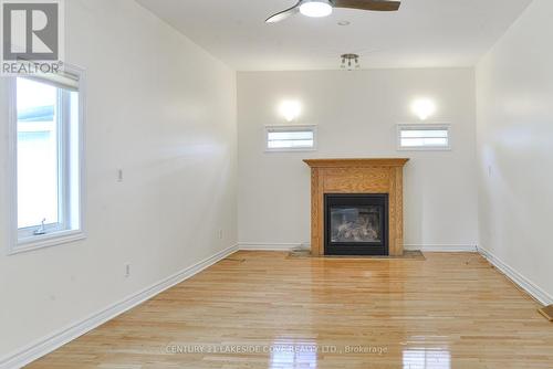 24 Turtle Path, Ramara (Brechin), ON - Indoor With Fireplace