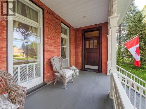 Covered porch with large original front door - 932 3Rd Avenue W, Owen Sound, ON - Outdoor With Exterior