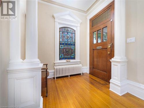 Beautiful leaded stained glass window at front entrance and lowest level of the tower - 932 3Rd Avenue W, Owen Sound, ON - Indoor Photo Showing Other Room