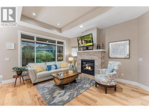 13117 Porter Drive, Lake Country, BC - Indoor Photo Showing Living Room With Fireplace