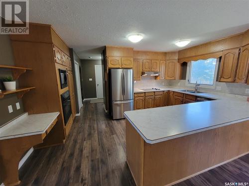 201 Arthur Street, Cut Knife, SK - Indoor Photo Showing Kitchen With Stainless Steel Kitchen With Double Sink