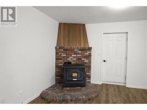 150 Angle Street, Kitimat, BC - Indoor Photo Showing Living Room With Fireplace