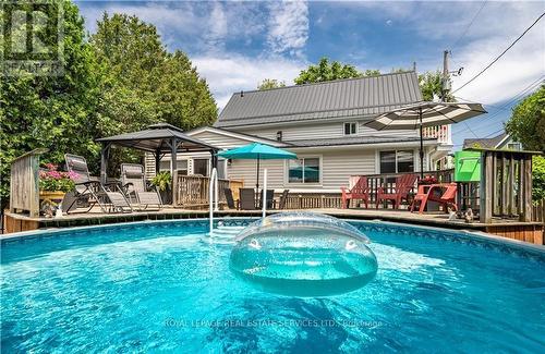 4 6Th Street, Grimsby, ON - Outdoor With Above Ground Pool With Deck Patio Veranda With Backyard