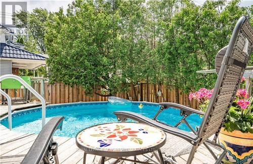 4 6Th Street, Grimsby, ON - Outdoor With Above Ground Pool With Deck Patio Veranda