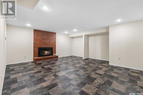 313 Bate Crescent, Saskatoon, SK - Indoor With Fireplace