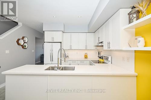 17 - 1401 Plains Road E, Burlington, ON - Indoor Photo Showing Kitchen With Double Sink