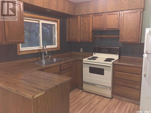 365 5Th Street Ne, Wadena, SK - Indoor Photo Showing Kitchen With Double Sink