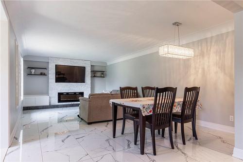 317 Glenholme Avenue, Hamilton, ON - Indoor Photo Showing Dining Room With Fireplace