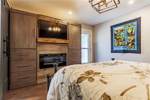 317 Glenholme Avenue, Hamilton, ON - Indoor Photo Showing Bedroom With Fireplace