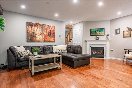 94 Huntingwood Avenue|Unit #3, Hamilton, ON - Indoor Photo Showing Living Room With Fireplace