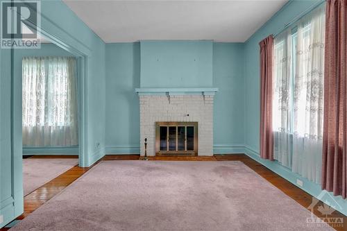 23 Bellwood Avenue, Ottawa, ON - Indoor Photo Showing Living Room With Fireplace