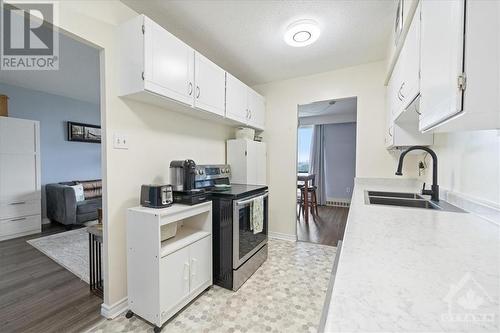 2400 Virginia Drive Unit#1102, Ottawa, ON - Indoor Photo Showing Kitchen With Double Sink