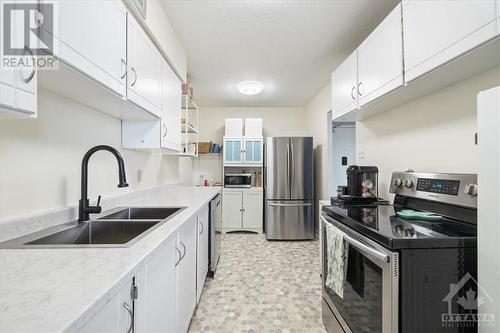 2400 Virginia Drive Unit#1102, Ottawa, ON - Indoor Photo Showing Kitchen With Double Sink