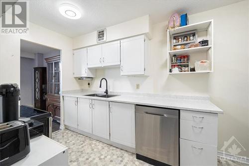 2400 Virginia Drive Unit#1102, Ottawa, ON - Indoor Photo Showing Kitchen With Double Sink