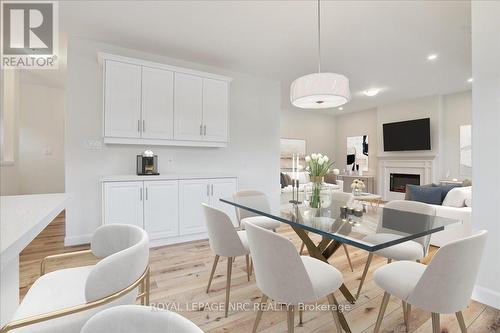 B - 11 Shores Lane, Fort Erie, ON - Indoor Photo Showing Dining Room With Fireplace