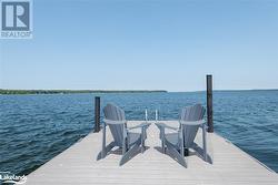 Beausoleil Island is in the distance right of the dock - 