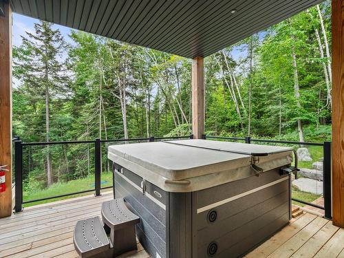 Hot tub - 145 Rue Du Mont-Washington, La Conception, QC - Outdoor With Deck Patio Veranda With Exterior