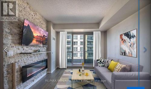 Ne1510 - 9205 Yonge Street, Richmond Hill, ON - Indoor Photo Showing Living Room With Fireplace