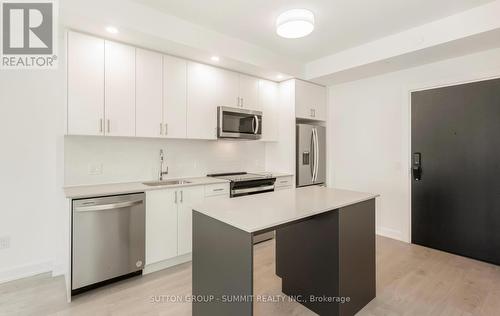 1117 - 3220 William Coltson Avenue, Oakville, ON - Indoor Photo Showing Kitchen With Stainless Steel Kitchen With Upgraded Kitchen