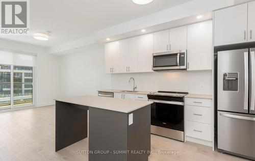 1117 - 3220 William Coltson Avenue, Oakville, ON - Indoor Photo Showing Kitchen With Stainless Steel Kitchen With Upgraded Kitchen