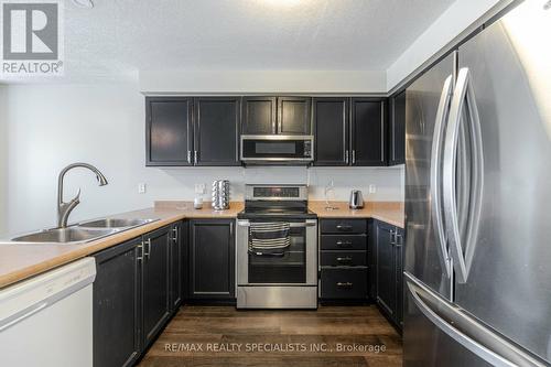 8A - 50 Howe Drive, Kitchener, ON - Indoor Photo Showing Kitchen With Double Sink