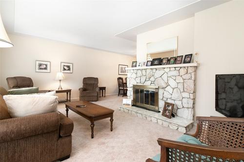 215 Sadler Road, Kelowna, BC - Indoor Photo Showing Living Room With Fireplace