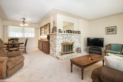 215 Sadler Road, Kelowna, BC - Indoor Photo Showing Living Room With Fireplace