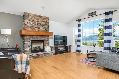 4979 Windsong Crescent, Kelowna, BC - Indoor Photo Showing Living Room With Fireplace