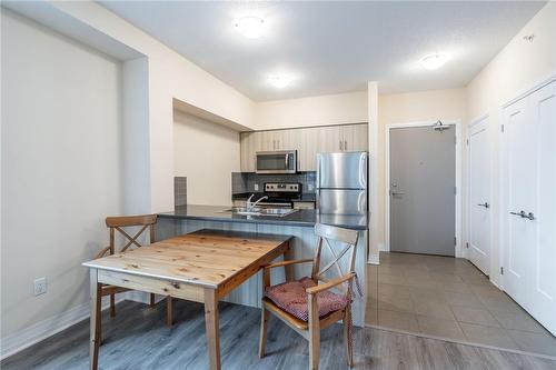 10 Concord Place|Unit #220, Grimsby, ON - Indoor Photo Showing Kitchen With Stainless Steel Kitchen