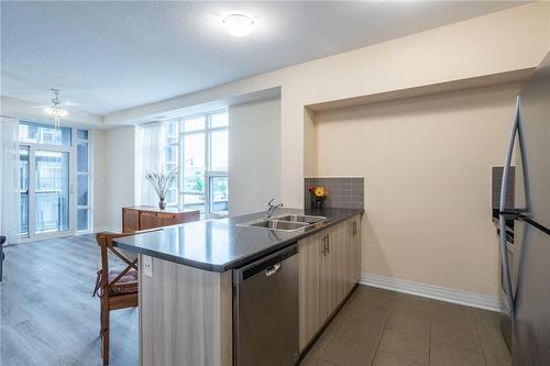 10 Concord Place|Unit #220, Grimsby, ON - Indoor Photo Showing Kitchen With Double Sink