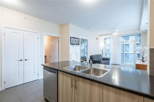 10 Concord Place|Unit #220, Grimsby, ON - Indoor Photo Showing Kitchen With Double Sink