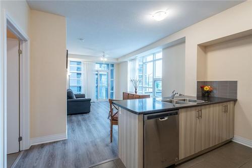 10 Concord Place|Unit #220, Grimsby, ON - Indoor Photo Showing Kitchen With Double Sink