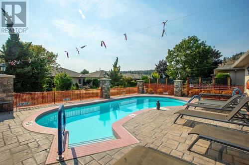 595 Yates Road Unit# 405, Kelowna, BC - Outdoor With In Ground Pool With Deck Patio Veranda With Backyard