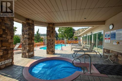 595 Yates Road Unit# 405, Kelowna, BC - Outdoor With In Ground Pool With Deck Patio Veranda With Exterior