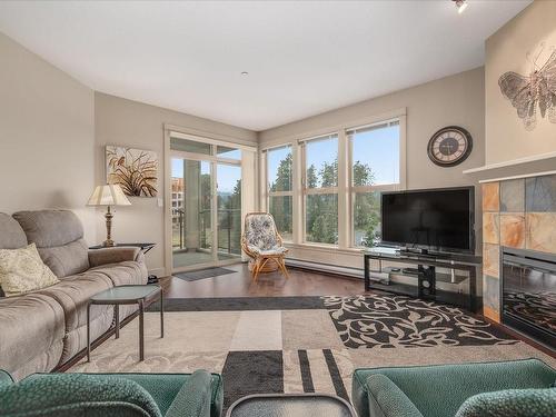 304-6310 Mcrobb Ave, Nanaimo, BC - Indoor Photo Showing Living Room With Fireplace