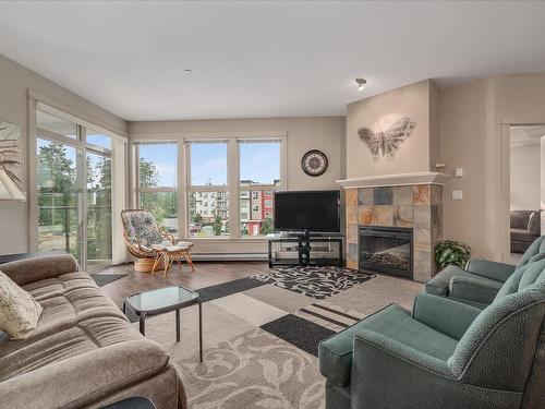 304-6310 Mcrobb Ave, Nanaimo, BC - Indoor Photo Showing Living Room With Fireplace