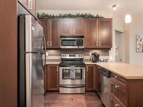 304-6310 Mcrobb Ave, Nanaimo, BC - Indoor Photo Showing Kitchen With Stainless Steel Kitchen