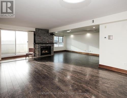 312 - 121 Woodbridge Avenue, Vaughan, ON - Indoor Photo Showing Living Room With Fireplace