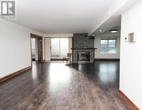 312 - 121 Woodbridge Avenue, Vaughan, ON - Indoor Photo Showing Living Room With Fireplace