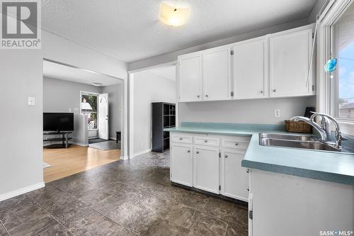 15 Stewart Avenue, Regina, SK - Indoor Photo Showing Kitchen With Double Sink