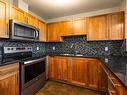 202-1629 Townsite Rd, Nanaimo, BC  - Indoor Photo Showing Kitchen With Stainless Steel Kitchen 